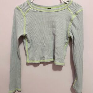 blue long sleeve with yellow stitching